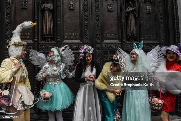 People wearing Easter bonnets and Easter costumes participate in the annual Easter parade along 5th Ave. On April 1, 2018 in New York City. Dateing...