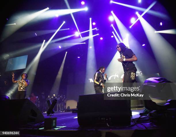 Takeoff, Offset, and Quavo of Migos perform during the V-103 Live Pop Up Concert at Philips Arena on March 31, 2018 in Atlanta, Georgia.