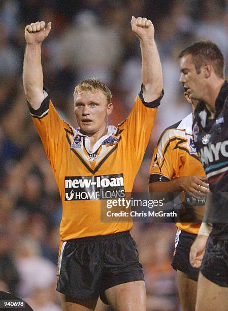 Robert Mears of the Tigers celebrates their win over the Panthers during the round 4 NRL match between the Penrith Panthers and the West Tigers held...