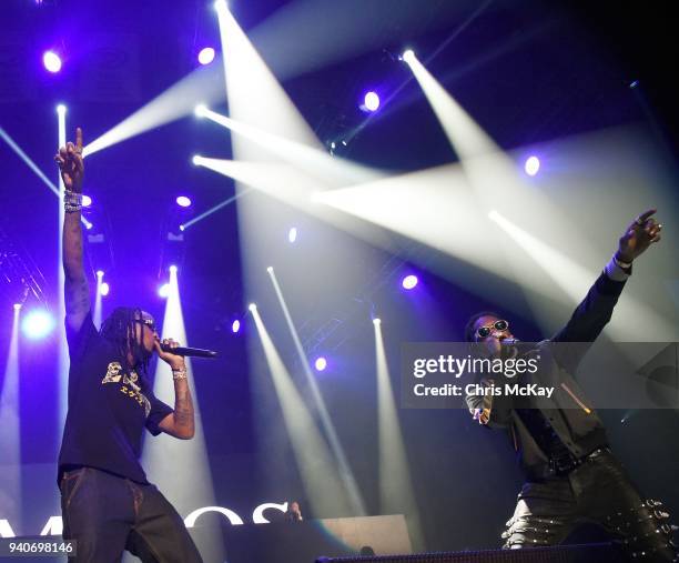 Quavo and Offset of Migos perform during the V-103 Live Pop Up Concert at Philips Arena on March 31, 2018 in Atlanta, Georgia.