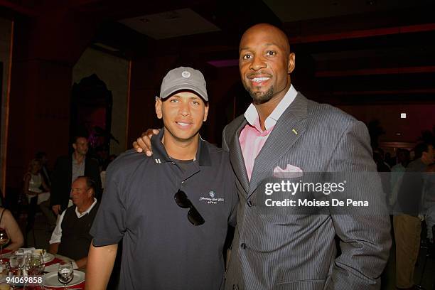 Alex Rodriguez and Alonzo Mourning attends the David Ortiz Celebrity Golf Classic Golf Tournament on December 5, 2009 in Cap Cana, Dominican Republic.