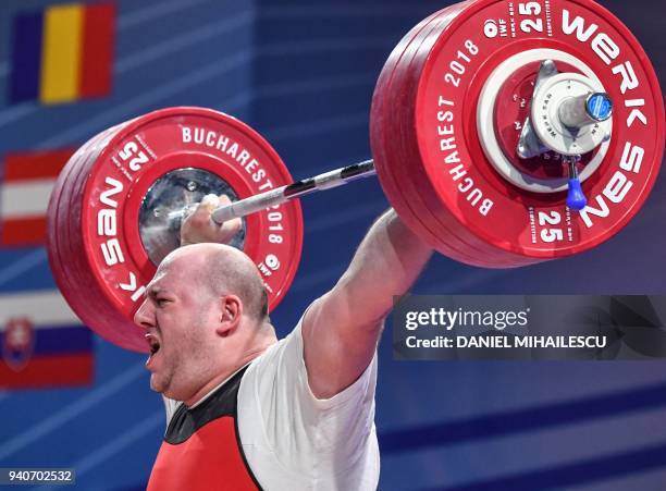 Bronze winner Peter Nagy of Hungary lifts during the men's senior +105 kg category of the European Weightlifting Championship in Izvorani, Romania,...