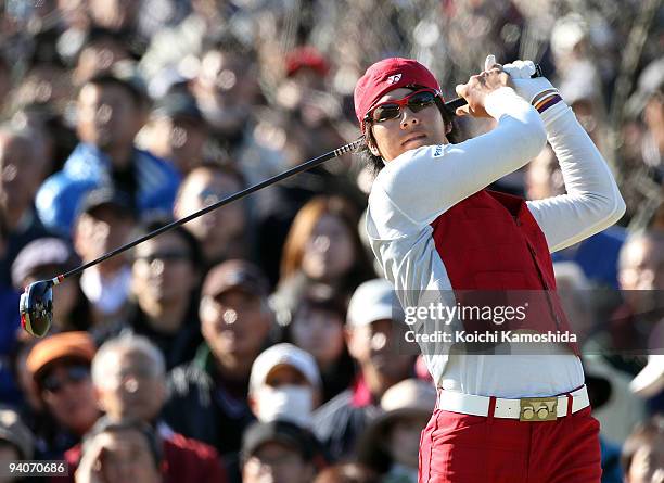 Ryo Ishikawa of Japan plays a tee shot during the final round of Nippon Series JT Cup at Tokyo Yomiuri Country Club on December 6, 2009 in Tokyo,...