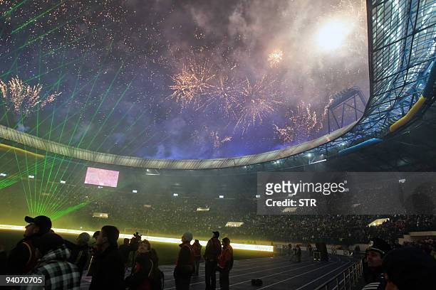 Fireworks illuminate the sky over the "Metalist" stadium during its inauguration ceremony in Kharkiv on December 5, 2009. Ukraine and Poland co-host...