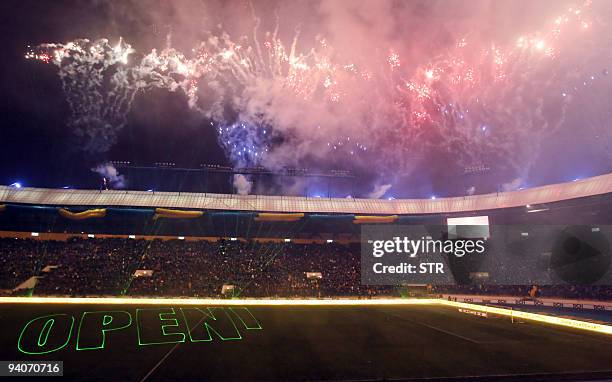 Fireworks illuminate the sky over the "Metalist" stadium during its inauguration ceremony in Kharkiv on December 5, 2009. Ukraine and Poland co-host...