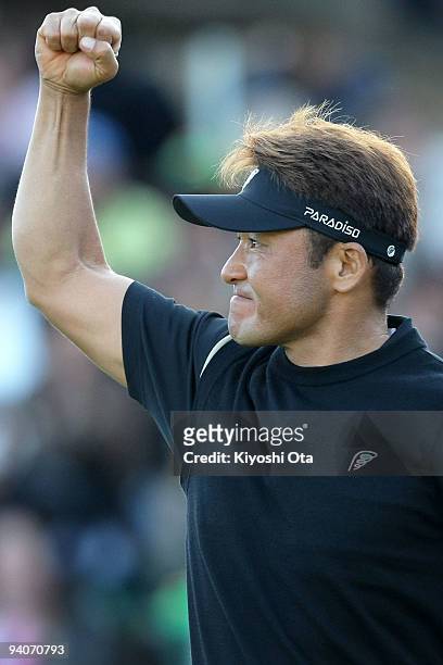 Shigeki Maruyama of Japan reacts after sinking the winning putt on the 18th hole during a playoff of the final round of the Nippon Series JT Cup at...