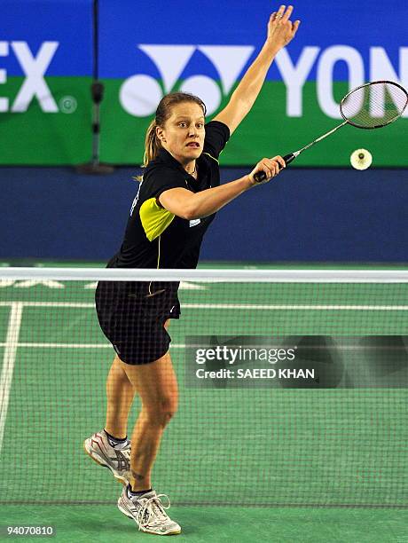 Juliane Schenk of Germany returns to Wong Mew Choo of Malaysia during women's singles final at the Badminton World Super Series Masters Finals in...