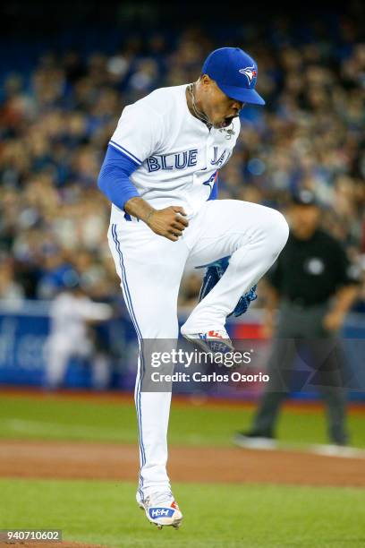 Blue Jays starter Marcus Stroman reacts after striking out Neil Walker of the Yankees to end the1st inning of MLB action as the Toronto Blue Jays...