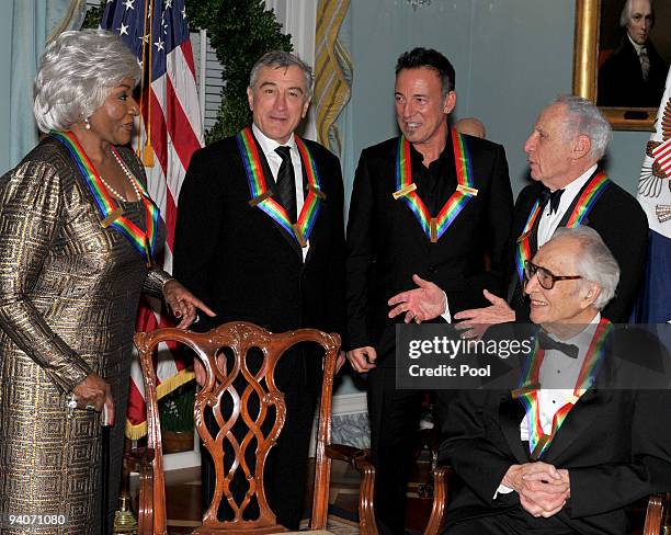 Kennedy Center honorees Grace Bumbry, Robert De Niro, Bruce Springsteen, Mel Brooks, and Dave Brubeck share some thoughts after posing for the formal...