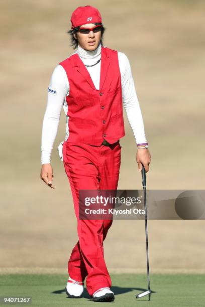 Ryo Ishikawa of Japan walks on the green during the final round of the Nippon Series JT Cup at Tokyo Yomiuri Country Club on December 6, 2009 in...