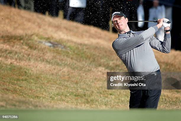 David Smail of New Zealand plays an approach shot during the final round of the Nippon Series JT Cup at Tokyo Yomiuri Country Club on December 6,...