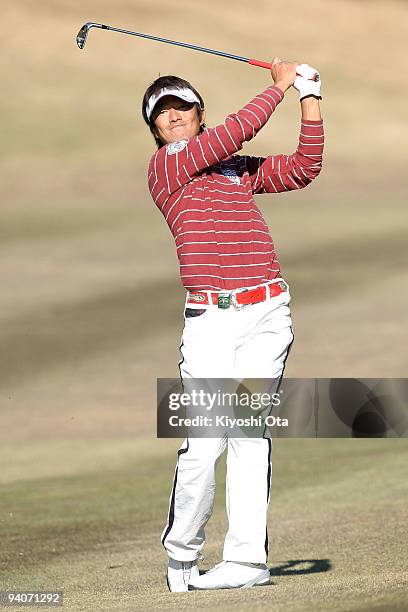 Kazuhiro Yamashita of Japan plays an approach shot on the 17th hole during the final round of the Nippon Series JT Cup at Tokyo Yomiuri Country Club...