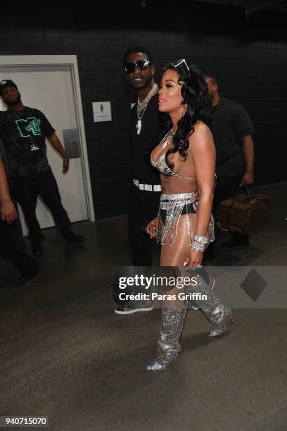 Gucci Mane and Keyshia Ka'Oir backstage at V-103 Live Pop Up Concert at Philips Arena on March 31, 2018 in Atlanta, Georgia.