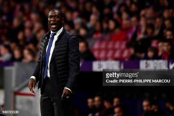 Deportivo La Coruna's Dutch coach Clarence Seedorf gives instructions during the Spanish League football match between Atletico Club Atletico de...