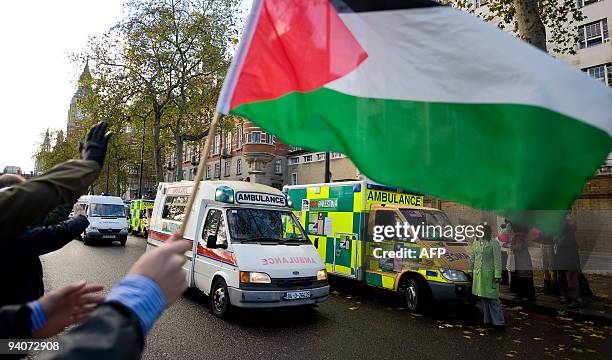 The "Viva Palestina" aid convoy of ambulances leaves Westminster in central London for Gaza on December 6, 2009. The Return to Gaza convoy was led by...