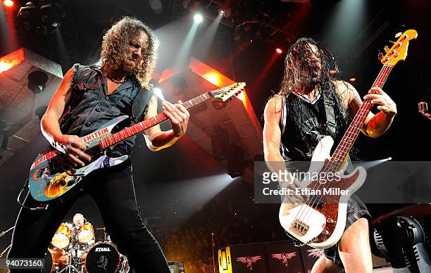 Metallica guitarist Kirk Hammett and bassist Robert Trujillo perform during a sold-out concert at the Mandalay Bay Events Center December 5, 2009 in...