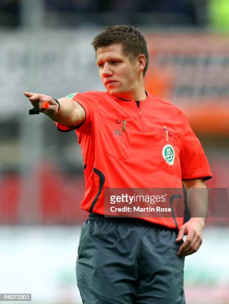 Referee Patrick Ittrich gestures during the Second Bundesliga match between SC Paderborn and MSV Duisburg at the Energieteam Arena on December 6,...