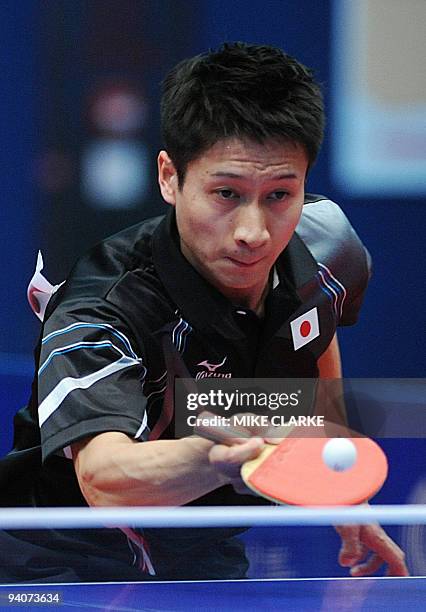 Kaii Yoshida of Japan returns to Zhang Ji Ke of China during their men's team table tennis competition finals match at the 2009 East Asian Games in...