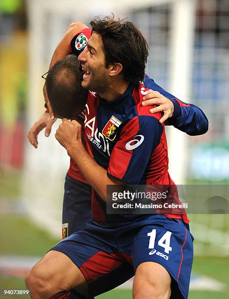 Rodrigo Palazio and Giuseppe Sculli of Genoa CFC celebrate the opening goal scored by Rodrigo Palacio during the Serie A match between Genoa CFC and...