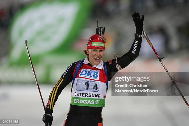 Kati Wilhelm of Germany celebrates after winning the Women's 4x6 km Relay in the E.ON Ruhrgas IBU Biathlon World Cup on December 6, 2009 in...