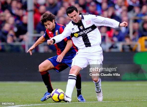 Giuseppe Sculli of Genoa CFC competes for the ball with Christian Panucci of Parma FC during the Serie A match between Genoa and Parma at Stadio...