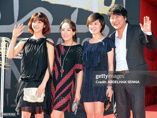 South-Korean actor Kim Ok Bin, Kang Soo Young, Moon So Ri and Song Kang Ho pose during a photocall at the 9th edition of the Marrakesh International...