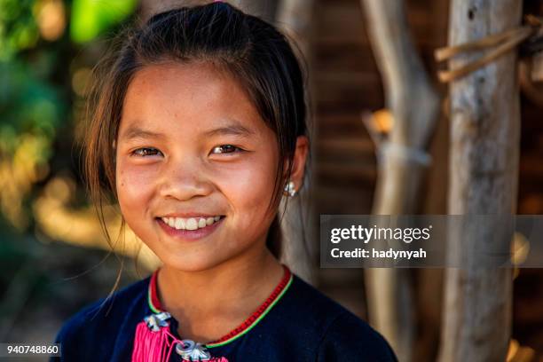 laotian little girl in a village in northern laos - developing countries stock pictures, royalty-free photos & images