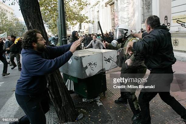 Greek youths clash with riot police during a demonstration commemorating the fatal shooting of 15-year-old Alexandros Grigoropoulos' by police a year...