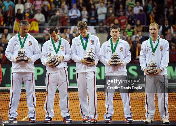 The Czech Republic team stand on the podium after being beaten 5-0 by Spain in the Davis Cup final between Spain and Czech Republic at the Palau Sant...