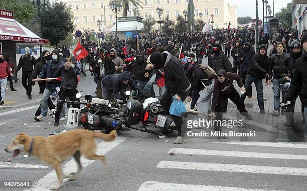 Greek youths clash with riot police during a demonstration commemorating the fatal shooting of 15-year-old Alexandros Grigoropoulos by police a year...