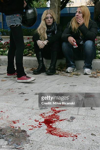 Blood marks the floor after clashes with riot police during a demonstration commemorating the fatal shooting of 15-year-old Alexandros Grigoropoulos'...