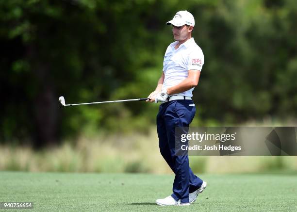 Emiliano Grillo of Argentina plays his second shot from the fairway on the second hole during the final round of the Houston Open at the Golf Club of...