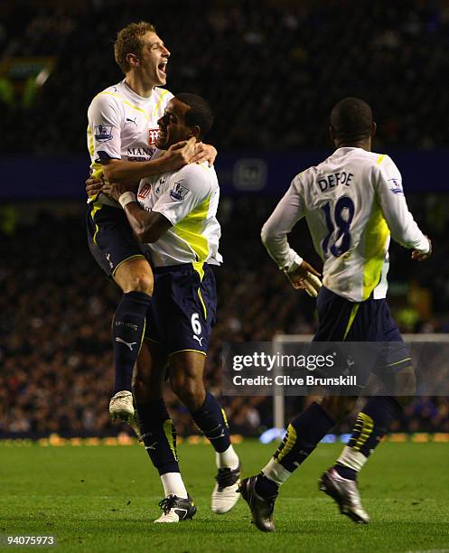 Michael Dawson of Tottenham Hotspur celebrates scoring his team's second goal with team mate Tom Huddlestone during the Barclays Premier League match...