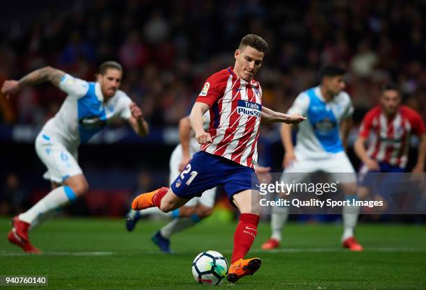 Kevin Gameiro of Atletico de Madrid scores his side's first goal from the penalty spot during the La Liga match between Atletico Madrid and Deportivo...
