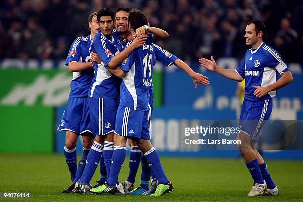 Kevin Kuranyi of Schalke celebrates scoring the first goal with team mates during the Bundesliga match between FC Schalke 04 and Hertha BSC Berlin at...