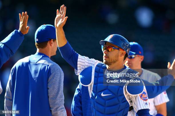 Travis d'Arnaud of the New York Mets celebrates after defeating the St. Louis Cardinals at Citi Field on March 31, 2018 in the Flushing neighborhood...