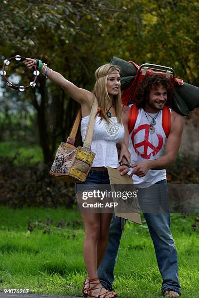 Israeli supermodel Bar Refaeli poses for a picture with Israeli TV personality Noam Tur, a former "Surviver" from the Israeli Channel 10 TV show...