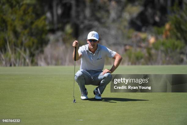 Scott Langley lines up a putt on the eighth green during the final round of the Web.com Tour's Savannah Golf Championship at the Landings Club Deer...