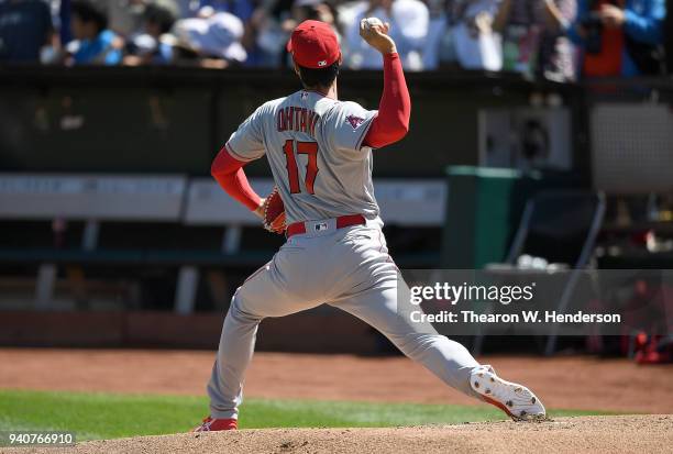 Shohei Ohtani of the Los Angeles Angels of Anaheim warms up in the bullpen prior to making his Major League pitching debut against the Oakland...