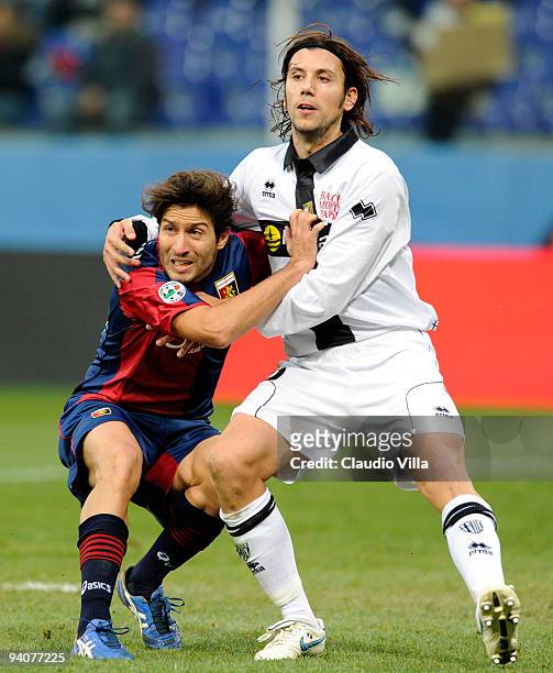 Giuseppe Sculli of Genoa CFC competes for the ball with Christian Zaccardo of Parma FC during the Serie A match between Genoa and Parma at Stadio...