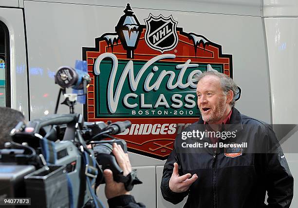 Dan Craig, the Facilities Operations Manager for the National Hockey League does an interview outside the Winter Classic truck that contains the...