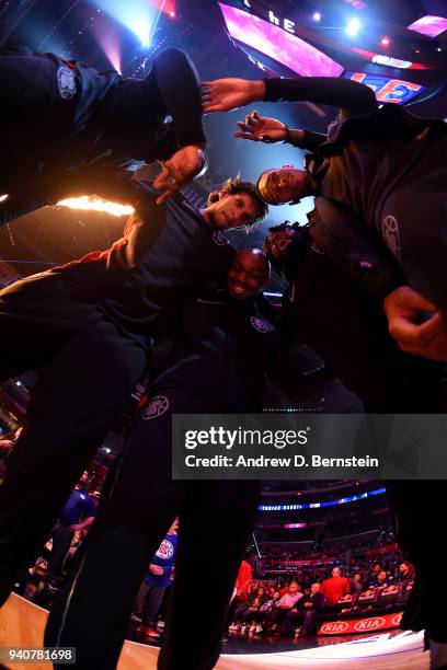 Boban Marjanovic C.J. Williams DeAndre Jordan and Avery Bradley of the LA Clippers huddle before the game against the Indiana Pacers on April 1, 2018...