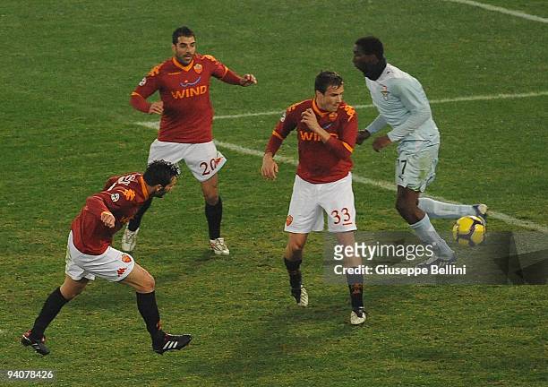 Marco Cassetti of AS Roma scores the opening goal during the Serie A match between AS Roma and SS Lazio at Stadio Olimpico on December 6, 2009 in...