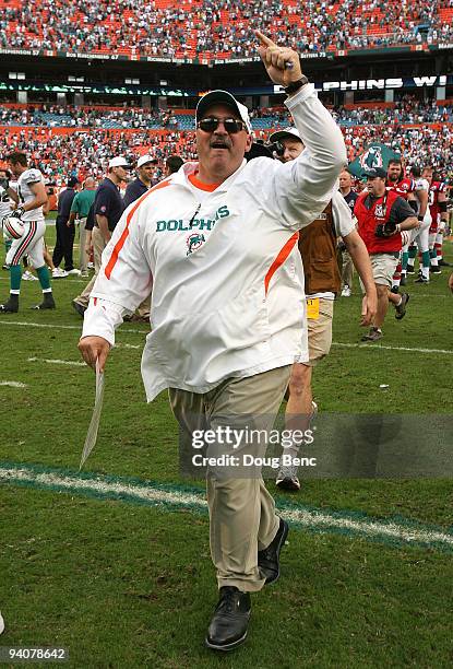 Head coach Tony Sparano of the Miami Dolphins celebrates after victory over the New England Patriots at Land Shark Stadium on December 6, 2009 in...