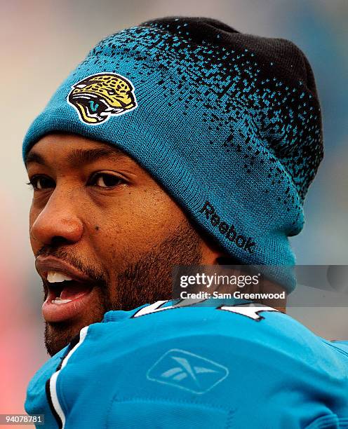 Torry Holt of the Jacksonville Jaguars watches the action during against the Houston Texans at Jacksonville Municipal Stadium on December 6, 2009 in...