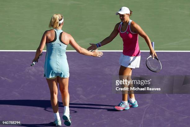 Ashleigh Barty of Australia and CoCo Vandeweghe of the United States celebrate after a point against Barbora Krejcikova and Katerina Siniakova of the...
