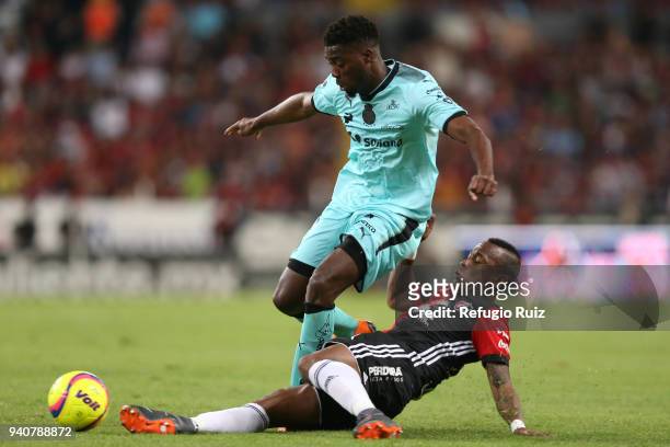 Leiton Jimenez of Atlas fights for the ball with Jorge Djaniny Tavares of Santos during the 13th round match between Atlas and Santos Laguna at...