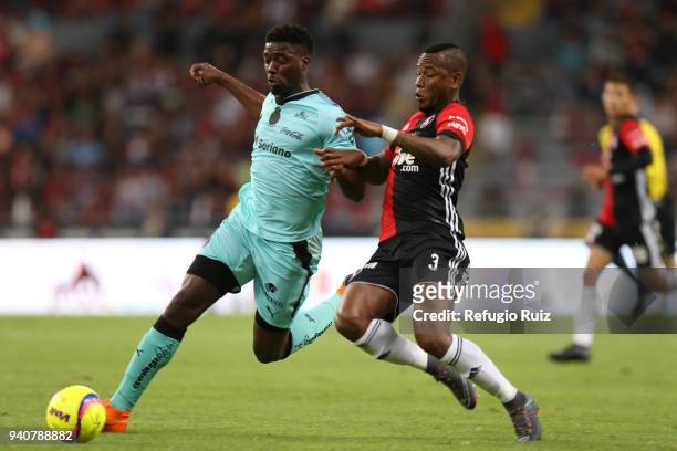 Leiton Jimenez of Atlas fights for the ball with Jorge Djaniny Tavares of Santos during the 13th round match between Atlas and Santos Laguna at...