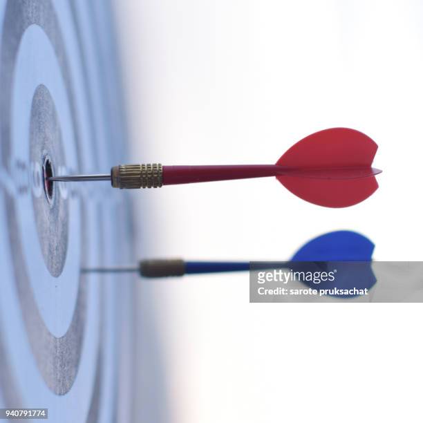 dart is an opportunity and dartboard is the target and goal. so both of that represent a challenge. opportunity, risk management, business concept , success winner business concept - risk scoring stock pictures, royalty-free photos & images