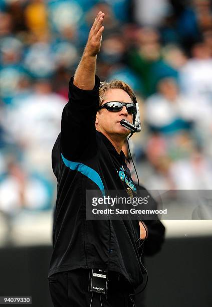 Head coach Jack Del Rio of the Jacksonville Jaguars moves the offense into position during the game against the Houston Texans at Jacksonville...